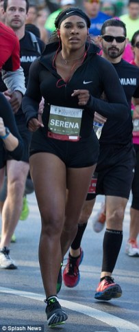 Music motivator: The sporting great kept her headphones in her ears the entire race.